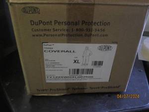 lot 81 image: case of dupont xl coveralls...