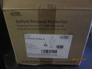 lot 83 image: case of dupont xl coveralls...