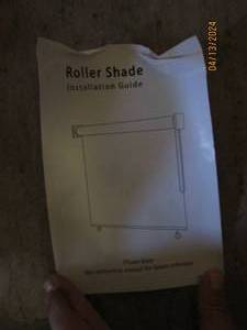 lot 149 image: 7.5 foot x 6 foot long outdoor roller shade