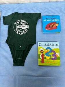 lot 91 image: Lot of Various Baby Infant Kid Childs Clothes Book and Swaddle
