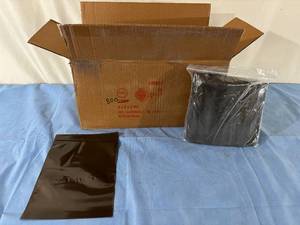lot 36 image: 1 Case (800 each) NEW Gold Seal 0203 6x8 Amber  Zip Lock Bags -ideal for transporting light-sensitive items, offering protection with a strong reclosable zipper, opaque exterior, amber color, and 3 mil thickness.