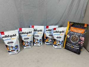 Solid Gold Meal Topper and Instinct Rawboost Dog Food