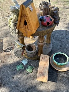 lot 5 image: 16 Garden Decorations- (Table not included)
