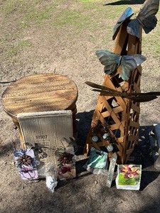 lot 8 image: Garden Decor & Plant Bulbs (Some new)-(Table not included)