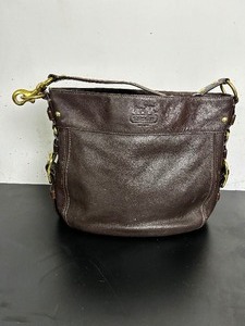lot 64 image: Like new brown  coach purse