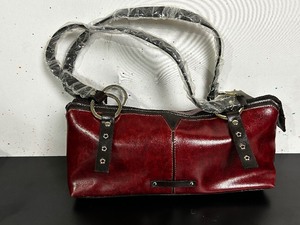 lot 63 image: New Red Rena rich handbag company purse with tags