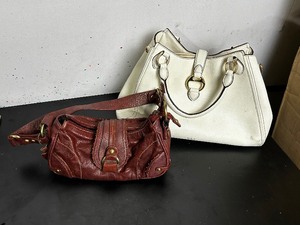 lot 84 image: Two purses brown and white