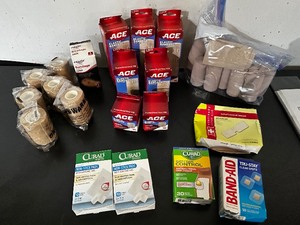 lot 123 image: Assortment of New Ace Bandage Wraps and Band-Aids