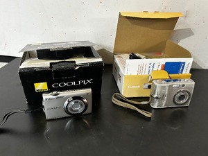 lot 149 image: New Nikon CoolPix Camera and Used Nikon Digital Camera