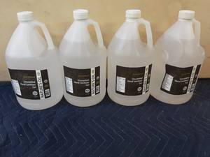 lot 37 image: Four jugs of unscented hand sanitizer gel