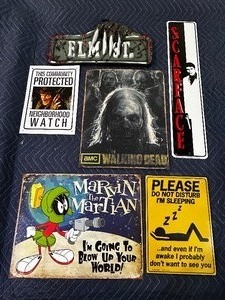 lot 181 image: Six miscellaneous vintage metal signs (walking dead, Freddy, Marvin the Martian)