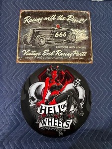 lot 184 image: Two devilish vintage metal signs