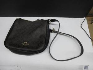 lot 846 image: COACH Ellie File Bag In Signature Canvas SMELLS LIKE PERFUME, MISSING ZIPPER HOOK ON BACK, GOOD CONDITION, USED