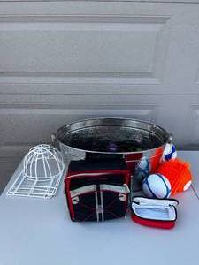 lot 18 image: Baseball Hat Wash Holder  Artic Zone Soft Cooler  Two Jump Ropes  Hacky Sack  Over the Ear Headphones