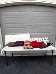 lot 33 image: Various Decorative Pillows with Outdoor Candle