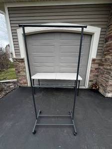 lot 49 image: Clothes Rack with Wheels