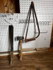 lot 53 image: Hatchet  Machete  Firewood Saw