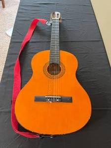 lot 109 image: Melody 6 String Acoustic Guitar