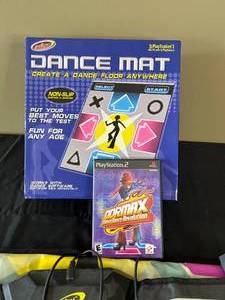 lot 131 image: PlayStation 2 Dance Dance Revolution Max and Dance Pad