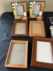 lot 157 image: Fun and Unique Picture Frames (16) inc. Sports and Lighthouse Themes