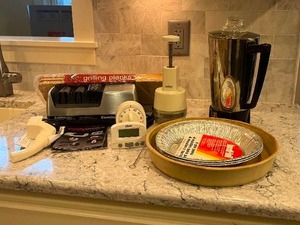 lot 212 image: Electric Knife Sharpener, Grilling Planks, Percolator, Kitchen Timers, Pie Dish, Pie Tins and More