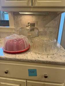 lot 219 image: Glass Cake Stand, Plastic Cake Plate w Cover and To-Go Bundt Cake Container - Excellent Condition
