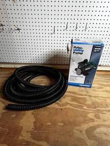 lot 75 image: Flotec Utility Multi Purpose Pump  Black Hose