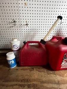 lot 83 image: 2 Gasoline Cans  Funnel  Pool Chemicals