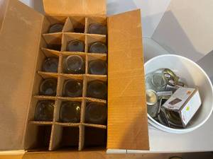 lot 259 image: Box with Two Rows of Empty Mason Jars  Bucket Full of Mason Jars and Lids