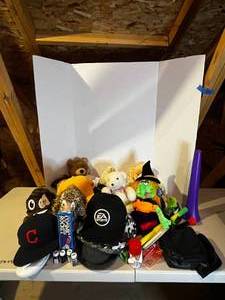 lot 269 image: Stuffed Animals  Hats  Cosmic Rocket