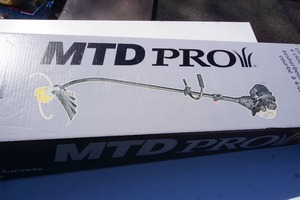 lot 86 image: Lawn & Garden MTD Pro Curved Shaft, 4-Cycle Trimmer