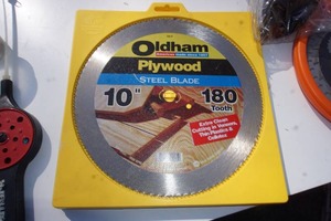 lot 92 image: Garage Miscellaneous...Fountain Pump Steel Saw Blades Plywood Etc.