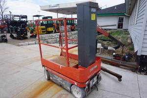 lot 13 image: 2013 Sky Jack Model SJ12 Vertical Mast Man Lift