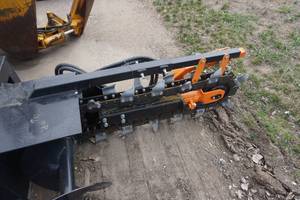 lot 23 image: Brand New Universal Mount Bobcat Skid Loader Skid Steer 48 Hydraulic Trencher Attachment