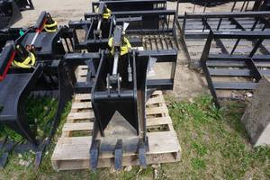 lot 22 image: Brand New Made In America Universal Mount Bobcat Skid Loader Skid Steer Stump Grapple Bucket