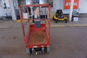 lot 12 image: 2013 Sky Jack Model SJ16 Vertical Mast Man Lift