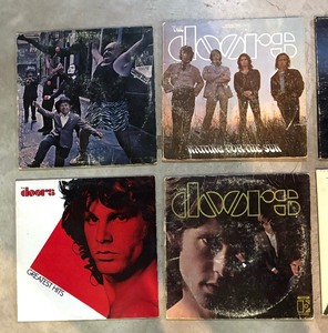 lot 113 image: Eight Record Albums by The Doors