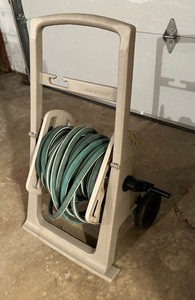 lot 118 image: Suncast Hose Reel with Hose