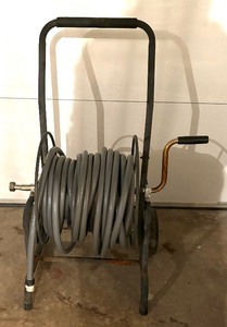 lot 136 image: Metal Hose Reel with Hose