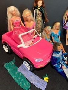 lot 263 image: Wonderful Vintage Barbies, Barbie Car, Clothes and SO Much More