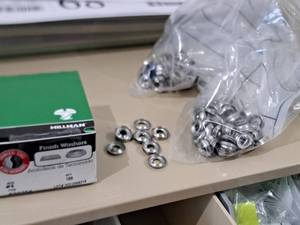 lot 63 image: Lot of (300) Hillman #8 Stainless Steel Finish Washers #H830754