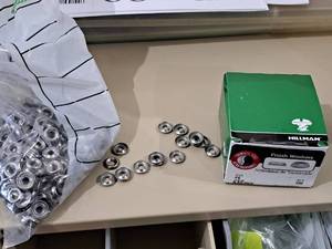 lot 65 image: Lot of (550) Hillman #6 Stainless Steel Finish Washers #H830752