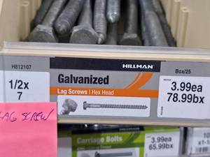 lot 93 image: Lot of (29) Hillman Galvanized Lag Screws 12x7  Hex Head #H812107