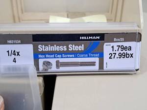 lot 284 image: Lot of (40) Hillman Stainless Steel Cap Screws 14x4  Hex Head  Coarse Thread #H831534