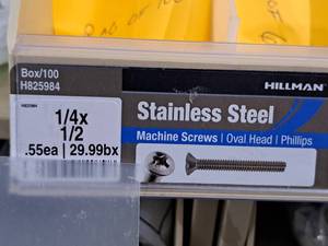 lot 402 image: Lot of (100) Hillman Stainless Steel Machine Screws 14x12  Oval Head  Phillips Drive #H825984