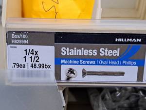 lot 409 image: Lot of (75) Hillman Stainless Steel Machine Screws 14x1-12  Oval Head  Phillips Drive #H825994