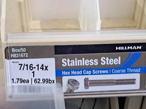lot 553 image: Lot of (47) Hillman Stainless Steel Cap Screws 716-14x1  Hex Head  Coarse Thread #H831672