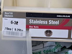 lot 807 image: Lot of (200) Hillman 6-32 Stainless Steel Hex Nuts #H829224