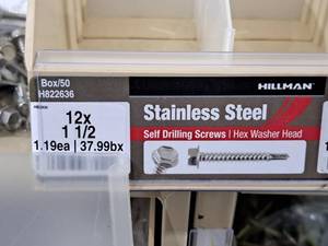 lot 820 image: Lot of (70) Hillman Stainless Steel Self Drilling Screws 12x1-12  Hex Washer Head #H822636