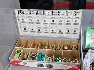 lot 1865 image: Parts Organizer with Assorted Left Hand Hex Nuts